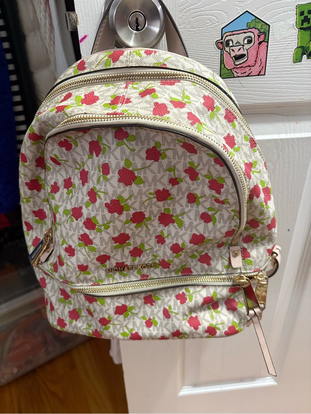 Michael Kors Cream Floral Mini Backpack with Pink and Green Accents
